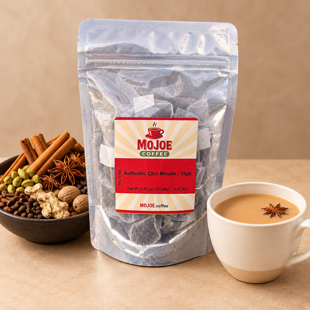 Authentic Chai Masala tea pouch beside a cup of creamy chai and a bowl of whole spices