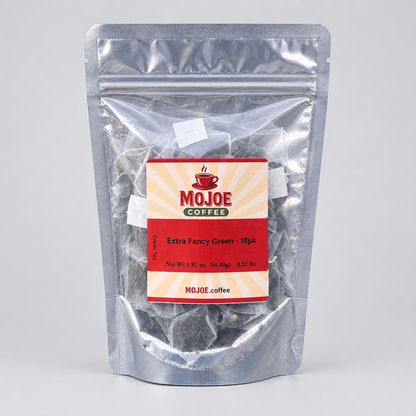 Extra Fancy Green tea pouch on a light-gray studio background
