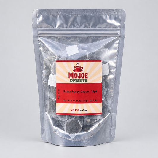 Extra Fancy Green tea pouch on a light-gray studio background